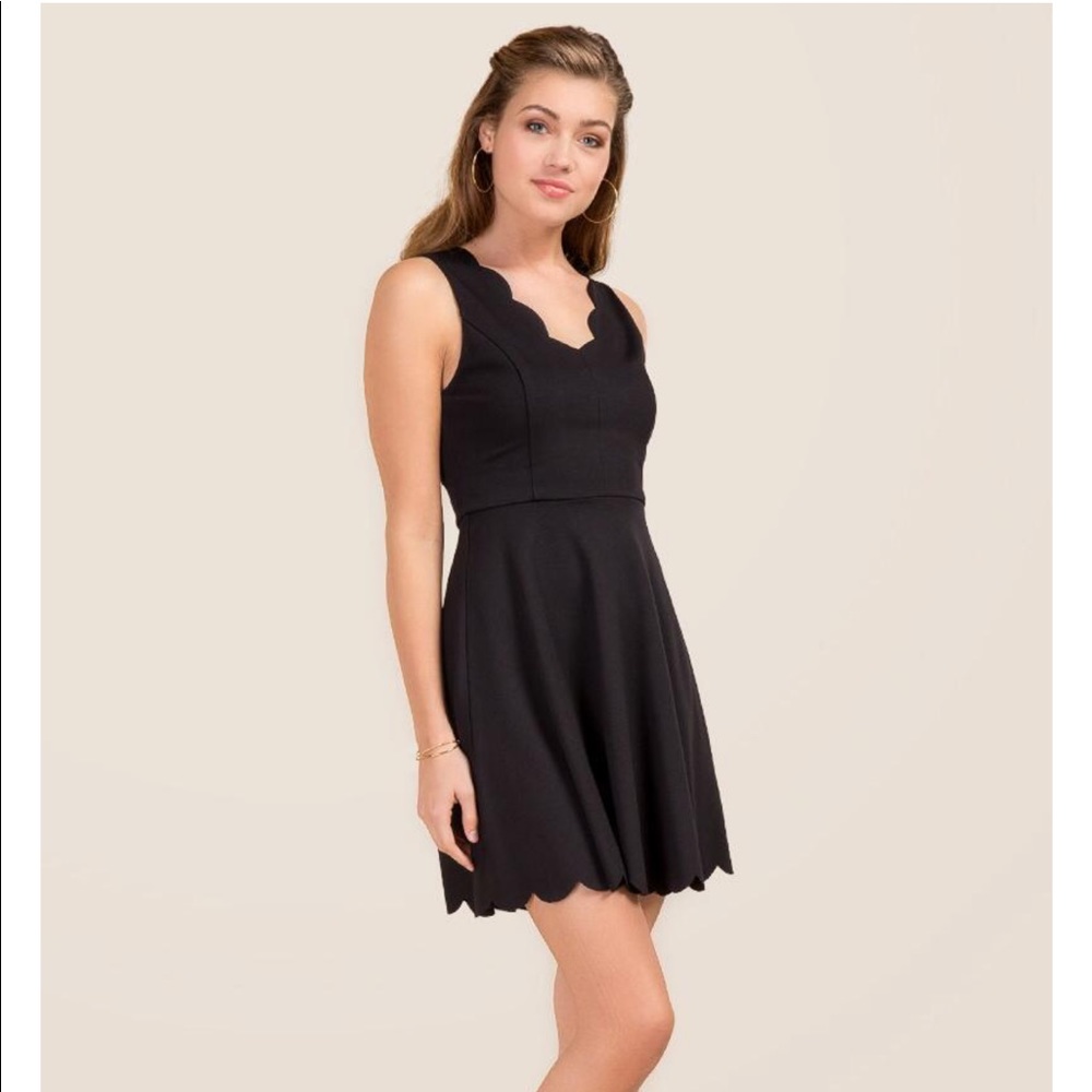 Scalloped black dress